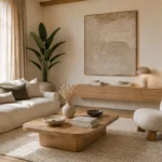 Bright minimalist living room featuring a neutral color palette, clean-lined furniture, natural textures, and clutter-free styling.